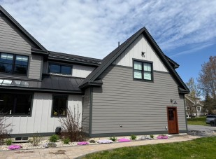 Soft washed home exterior with clean siding